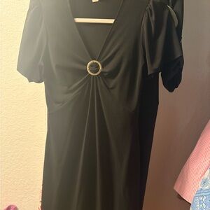 Elegant Black Dress with Ring Detail